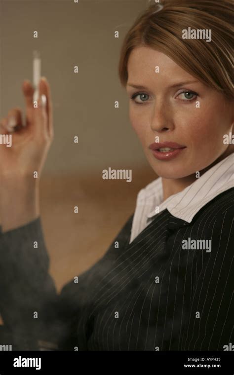 Blonde Businesswoman Smoking High Resolution Stock Photography And