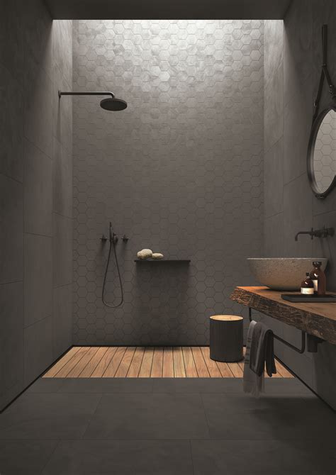 A Bathroom With A Wooden Floor And White Walls Along With An Open