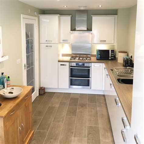 Taylor's flooring celebrates our ability to put customers first: Taylor Wimpey Bradenham Kitchen | Kitchen inspiration board, Kitchen inspirations, Interior ...