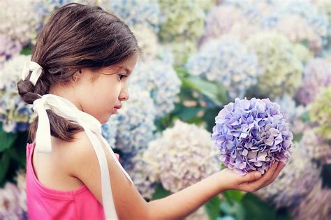 Little Girl Holding Flowers Photograph By Hulya Ozkok Pixels