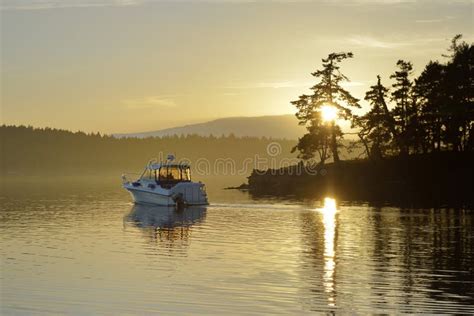 Small Motor Boat Leaving Conover Cove At Sunset Wallace Island Gulf