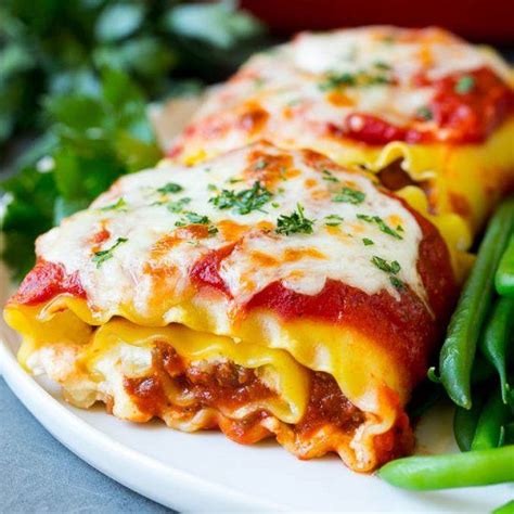 These Lasagna Roll Ups Are Lasagna Noodles That Are Topped With Ricotta