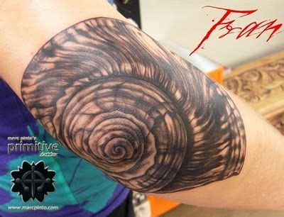 A Huge Shell Tattoo On An Elbow It Looks Awesome And Unique Shell Tattoos Elbow Tattoos