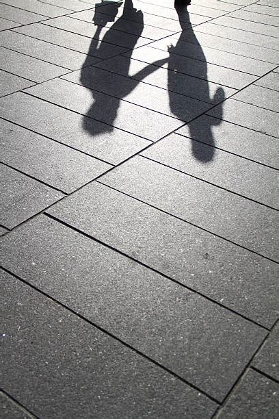 Shadow Of Couple Holding Hands Stock Photos Pictures And Royalty Free