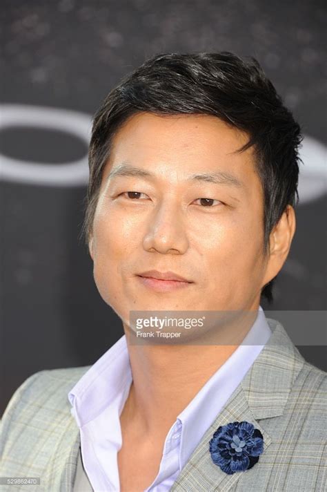 Actor Sung Kang Arrives At The Premiere Of Fast And Furious 6 Held At