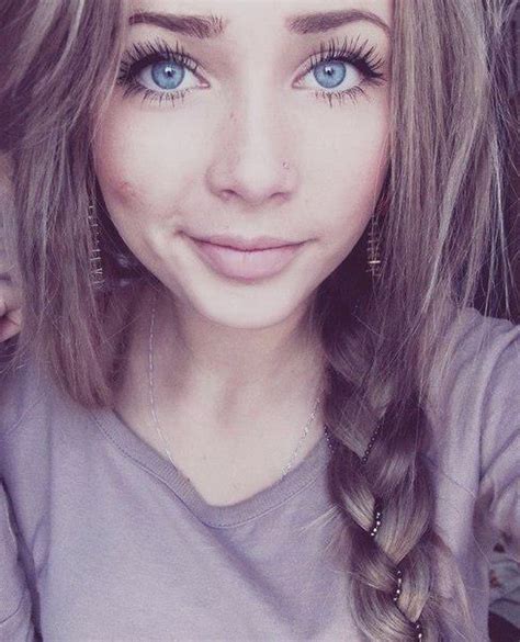 Pretty Girl With Light Brown Hair And Blue Eyes