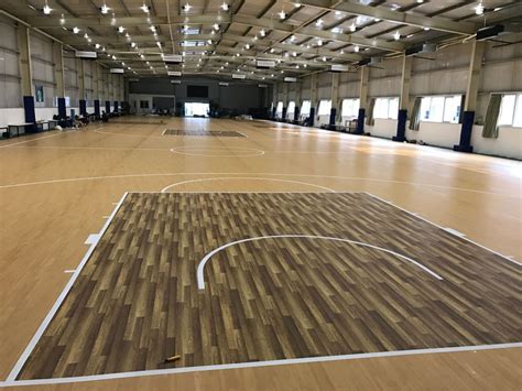 China Basketball Court Equipment Synthetic Pvc Wood Grain Floor Tile