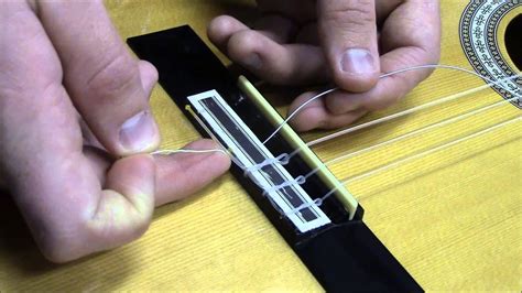 For many beginning guitar players (and even some advanced players), restringing your guitar is a chore many dread. How To Restring a Classical Guitar - YouTube