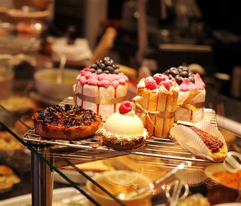 French Pastries On Display A Confectionery Shop Viajar Faz Bem