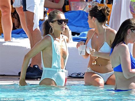 Towie S Megan Mckenna Flashes Side Boob At Champagne Spray Party In