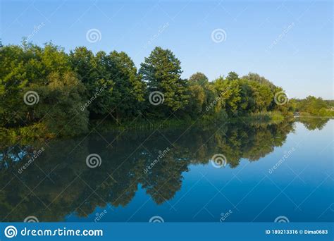River And Reflection Of Trees In Water Evening Landscape Of Nature