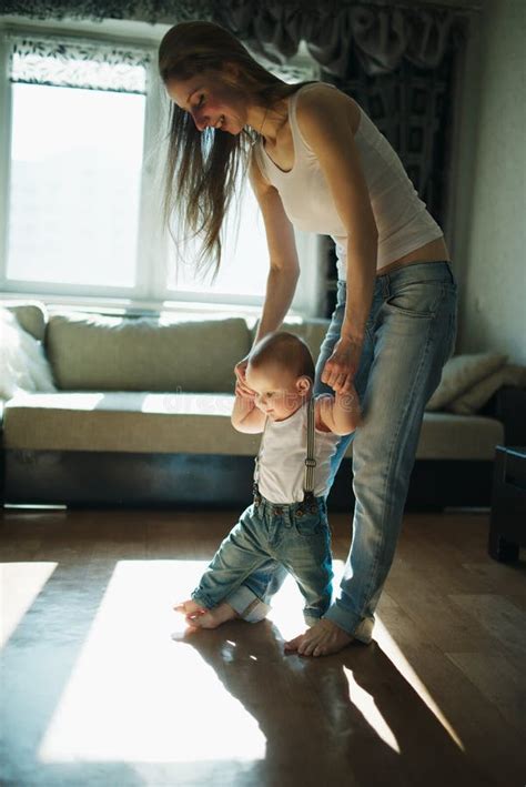 Beautiful Mother Teaches Baby To Walk Stock Image Image Of Happy