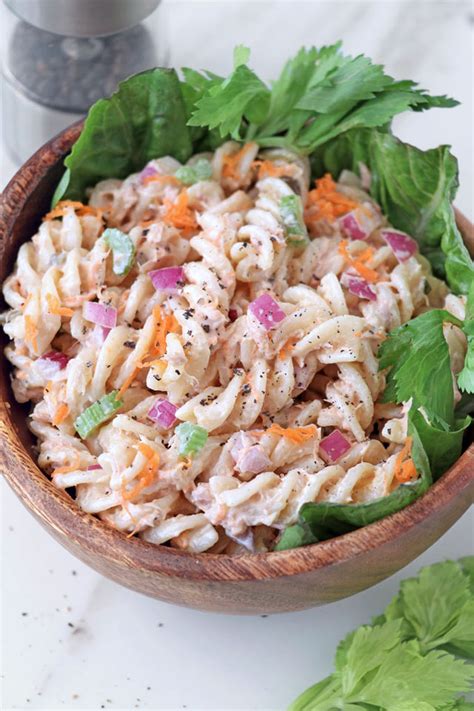 Classic tuna salad is the perfect choice for an easy and quick lunch, made out of savory tuna and crunchy celery, mixed with mayo, mustard, and relish, and a dash of lemon juice. Easy Tuna Pasta Salad Recipe | Foxy Folksy