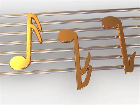 Golden Music Notes And Treble Clef On Musical Strings On Yellow Stock