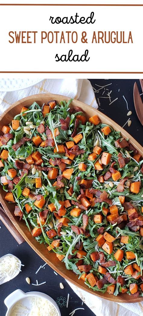 Roasted Sweet Potatoes And Arugula Come Together With Pine Nuts And A
