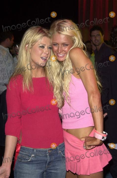 photos and pictures tara reid and paris hilton at fhm magazines sexiest party of the year to