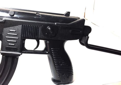 X2 Edison Giocattoli 13 Shot Uzi Cap Gun Pistol Revolver Toy Kid T