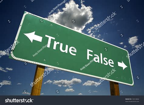 True False Road Sign With Dramatic Blue Sky And Clouds