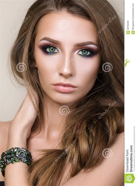 Beauty Portrait Of Young Pretty Girl With Green Eyes Stock