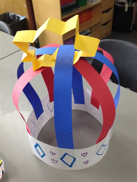 A Paper Crown Sitting On Top Of A Table