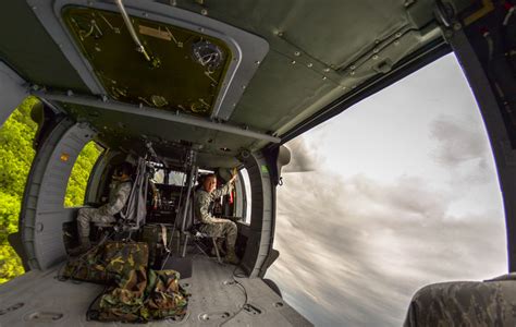 Inside Shot Of A Uh 60 Blackhawk Helicopter During A Banked Turn