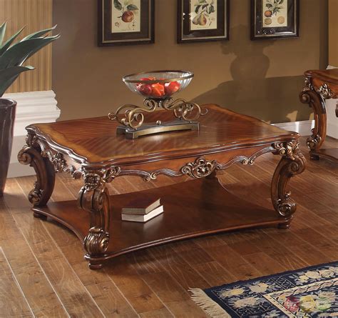The walnut and cherry woods give this traditional coffee table a natural warmth that complements any room. Vendome Traditional Ornate Coffee Table With Wood Top In ...
