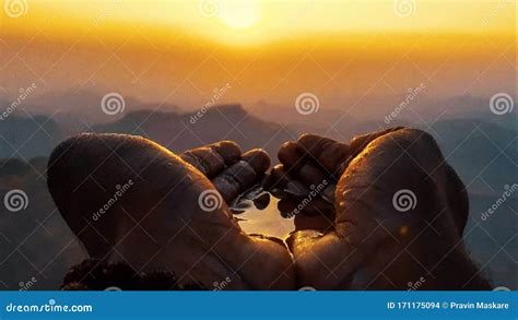 Two Hands With Water Sunrise Picture Stock Photo Image Of Sunrise