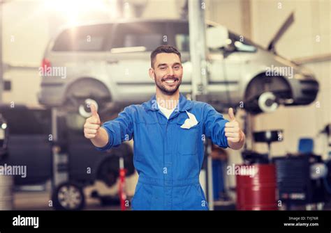 Happy Auto Mechanic Man Or Smith At Car Workshop Stock Photo Alamy