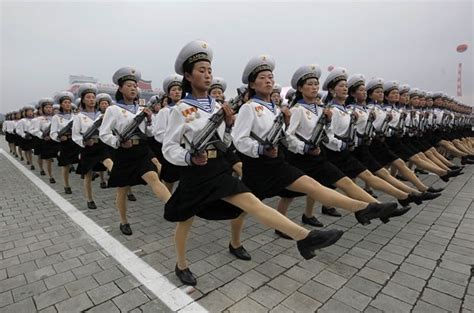 Apparently, it's socially unacceptable for north korean women to wear their hair down! Just for the Hell of it… North Korean Women, with Guns ...