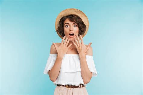 Premium Photo Portrait Of A Surprised Woman With Hands At Her Face
