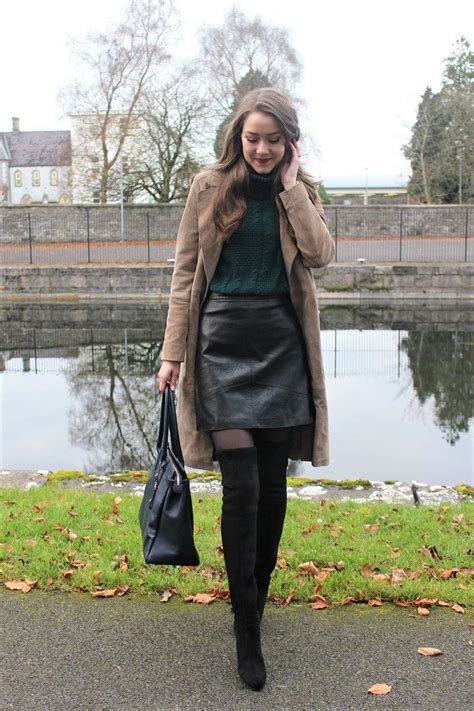 A Leather Skirt And Black Suede Thigh High Boots High Knee Boots