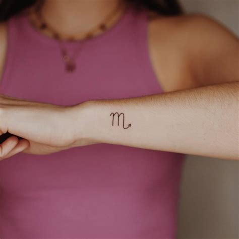 Minimalist Scorpio Zodiac Symbol Tattoo On The Wrist