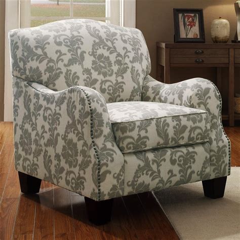 Gentle, sloping arms highlight this sophisticated accent chair. Accent Chair in Floral Pattern Fabric by Coaster - 503253