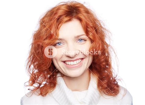 Portrait Of A Ginger Woman Smiling At Camera Royalty Free Stock Image