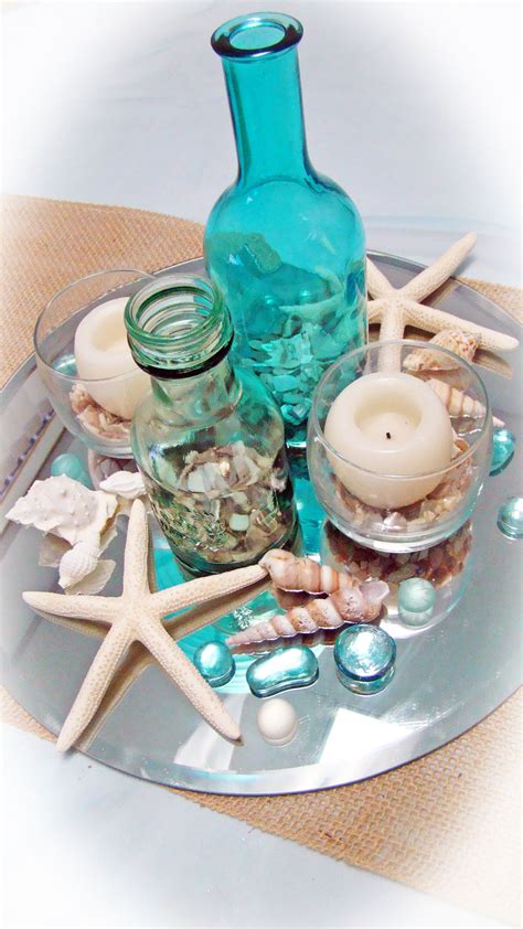 Photos of gorgeous beach wedding centerpieces made with fresh exotic and tropical flowers or beach elements like starfish, shells, sand.and more! # nautical # starfish wedding centerpiece | Wedding ...