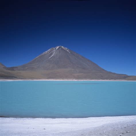 Stretching more than 4,050 square miles of the altiplano, it is the world's largest salt flat, left behind by prehistoric lakes evaporated long ago. Lake on Salar de Uyuni - David McNamara