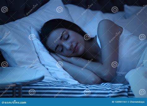 Young Woman Sleeping In Bed At Night Stock Image Image Of Bedroom