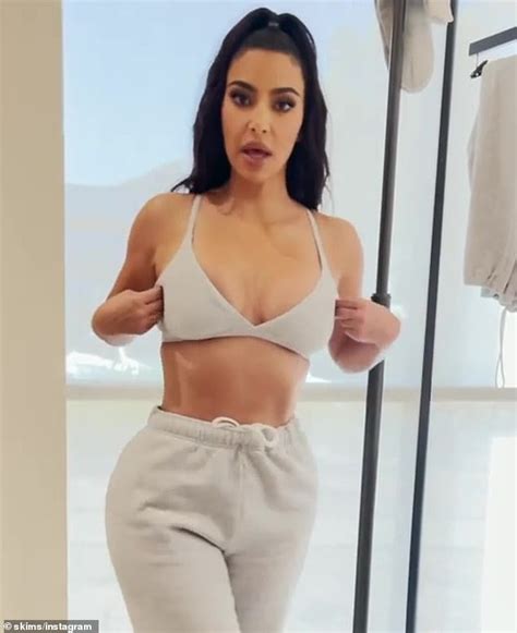 Kim Kardashian Shows Off Her Toned Tummy As She Poses In A Bra Daily Mail Online