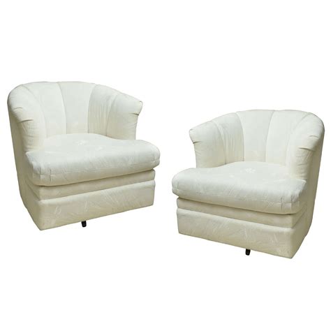 Plenty of vintage leather chair to choose from. Pair of Vintage Barrel Back Swivel Club Chairs at 1stdibs