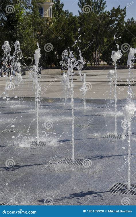 Water Jets Of The Fountain In The City Square Stock Photo Image Of