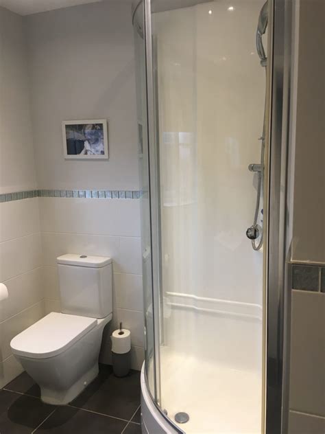 Fill a spray bottle with white vinegar, and use it to thoroughly saturate the glass. How To Clean and Remove Limescale From Shower Doors ...