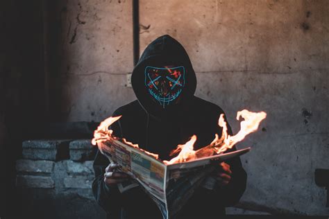 Mask Guy Reading A Burning News Paper Hd Photography 4k