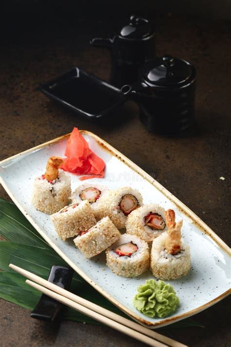 Sushi Roll With Fish In A Beautiful Blue Plate Stock Photo Image Of