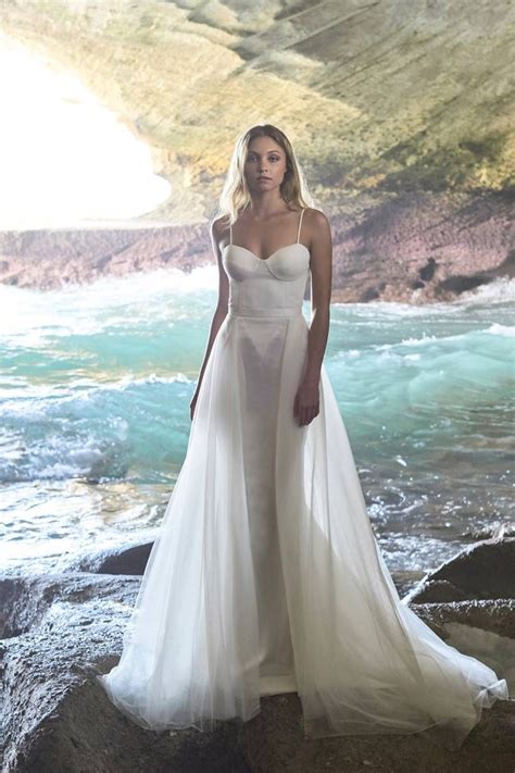 Relaxed And Romantic Beach Wedding Dresses Weddingdresses Beachwedding Wedding Dresses Corset