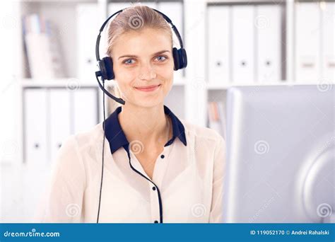 Call Center Operator Blonde Business Woman In A Headset In White