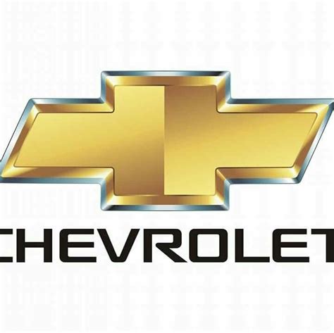 The Chevrolet Logo Is Shown In Gold And Silver On A White Background