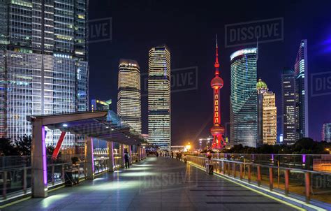 Pudong Skyline With Oriental Pearl Tower From Elevated Walkway At Night