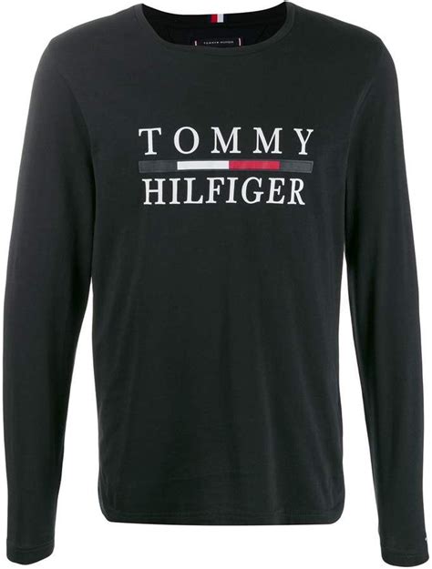 The logo itself is very unique, and it's on most, if not all of their clothing items. Tommy Hilfiger logo print jersey top | Tommy hilfiger ...