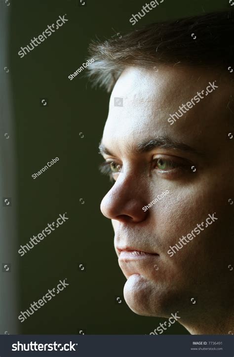 Man Green Eyes Stares Out Window Stock Photo 7736491 Shutterstock