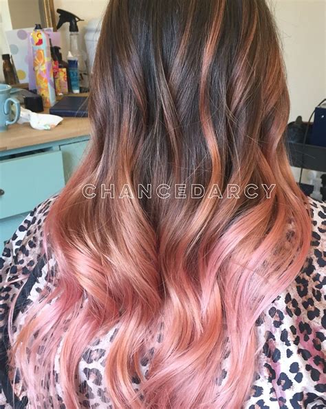 Red and pastel pink hair. Wavy, pink, strawberry, balayage, ombre, long blended hair! #hairbychancedarcy rose gold. Peach ...